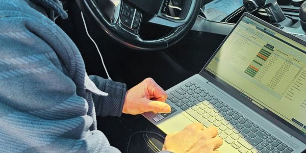 Automotive locksmith working on ignition