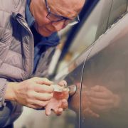 Mobile locksmith replacing vehicle key