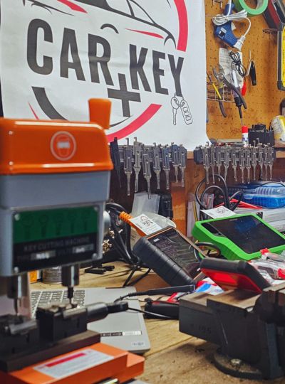Mobile locksmith unlocking vehicle